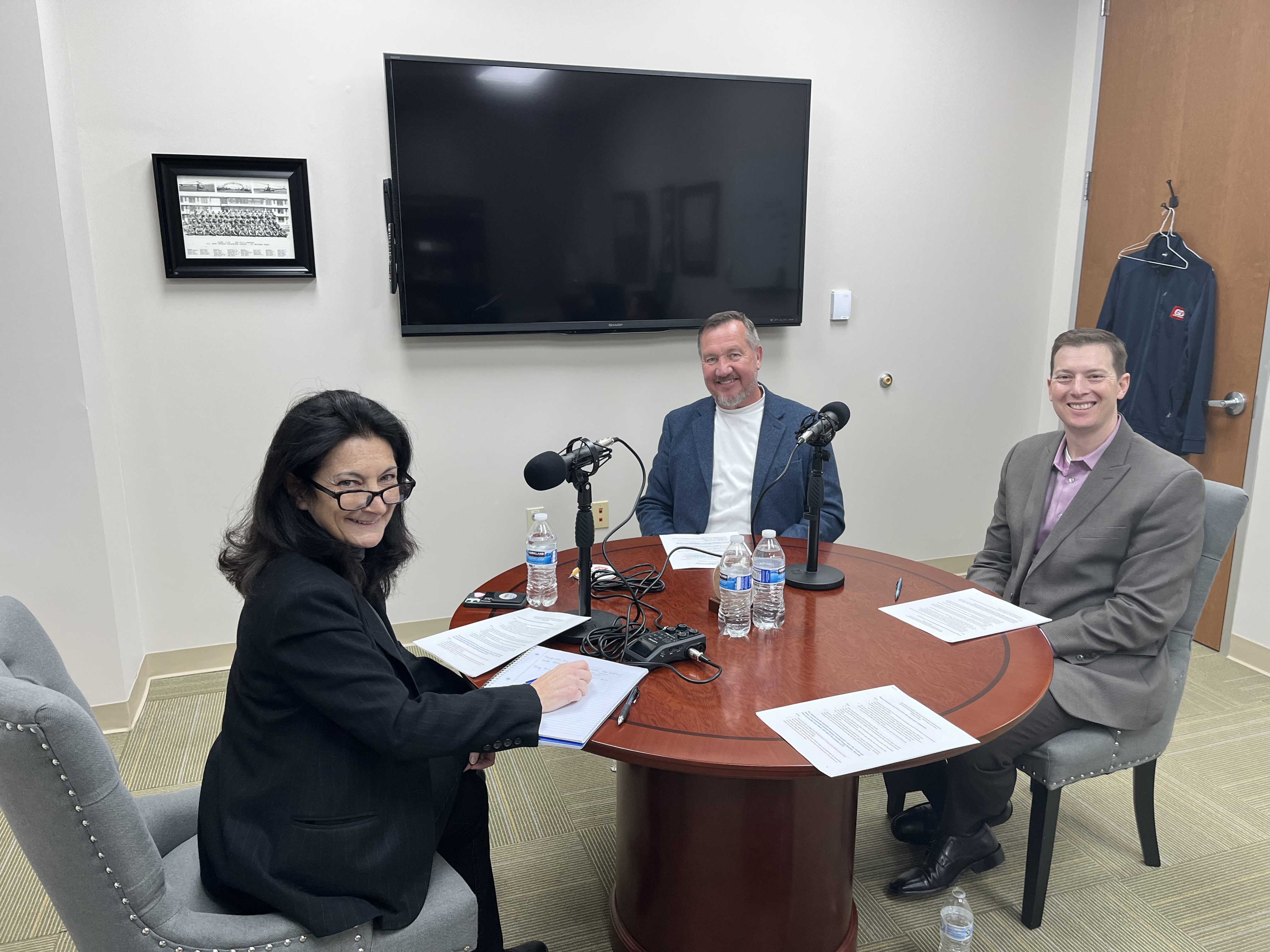 Photo of GD Energy Products employees being interviewed